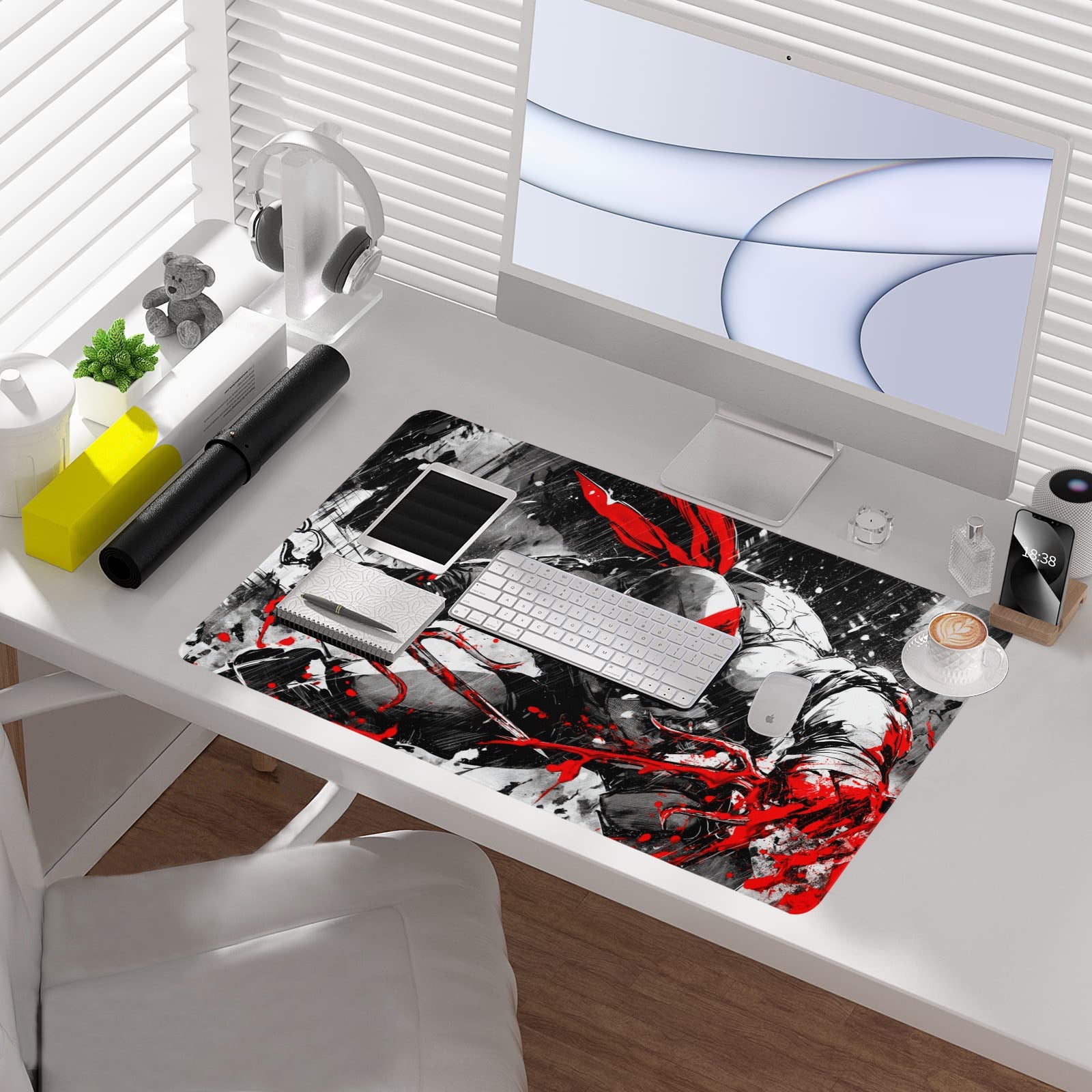 Raphael TMNT borderless playmat showcased on a desk with computer and accessories, featuring bold black and white art.