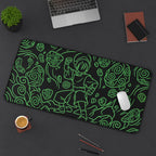Neon Toph playmat featuring a metalbending combat pose in vibrant neon colors on a sleek desk mat.